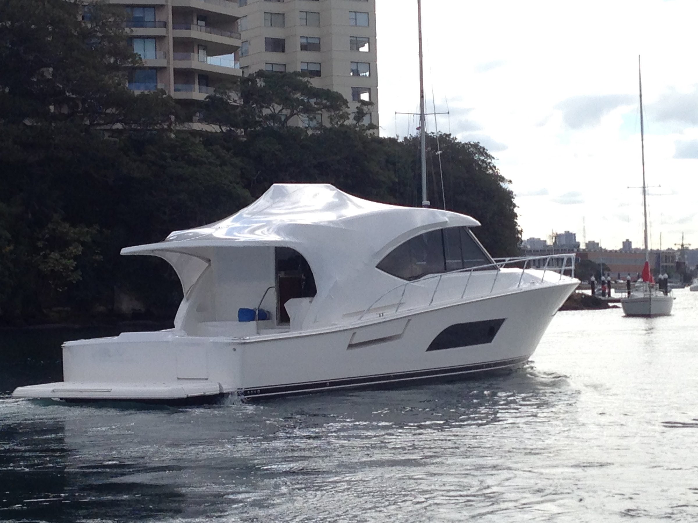 Shrink wrapped boat cruising on the water
