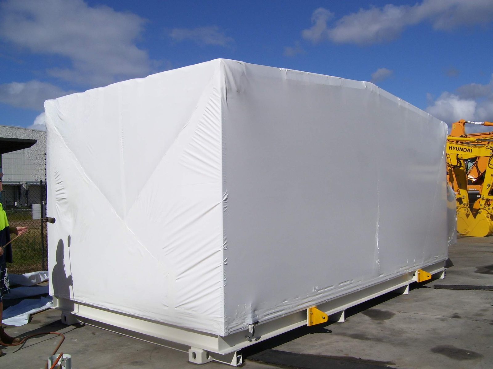 Shrink wrapped building module